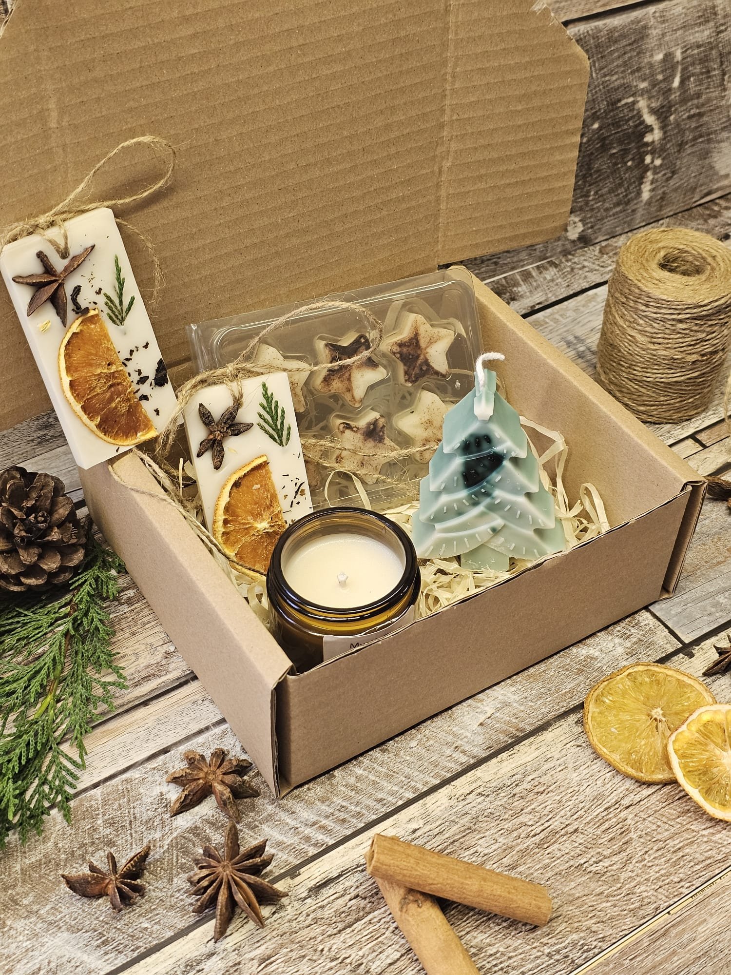 MysticGlow handmade Christmas candle gift box set displayed with dried citrus and cinnamon