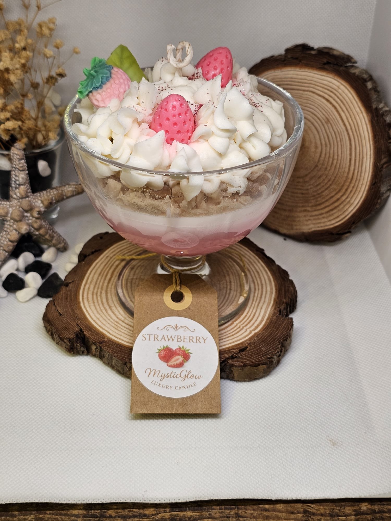strawberry cheesecake candle by MysticGlow with layered wax and strawberry topping