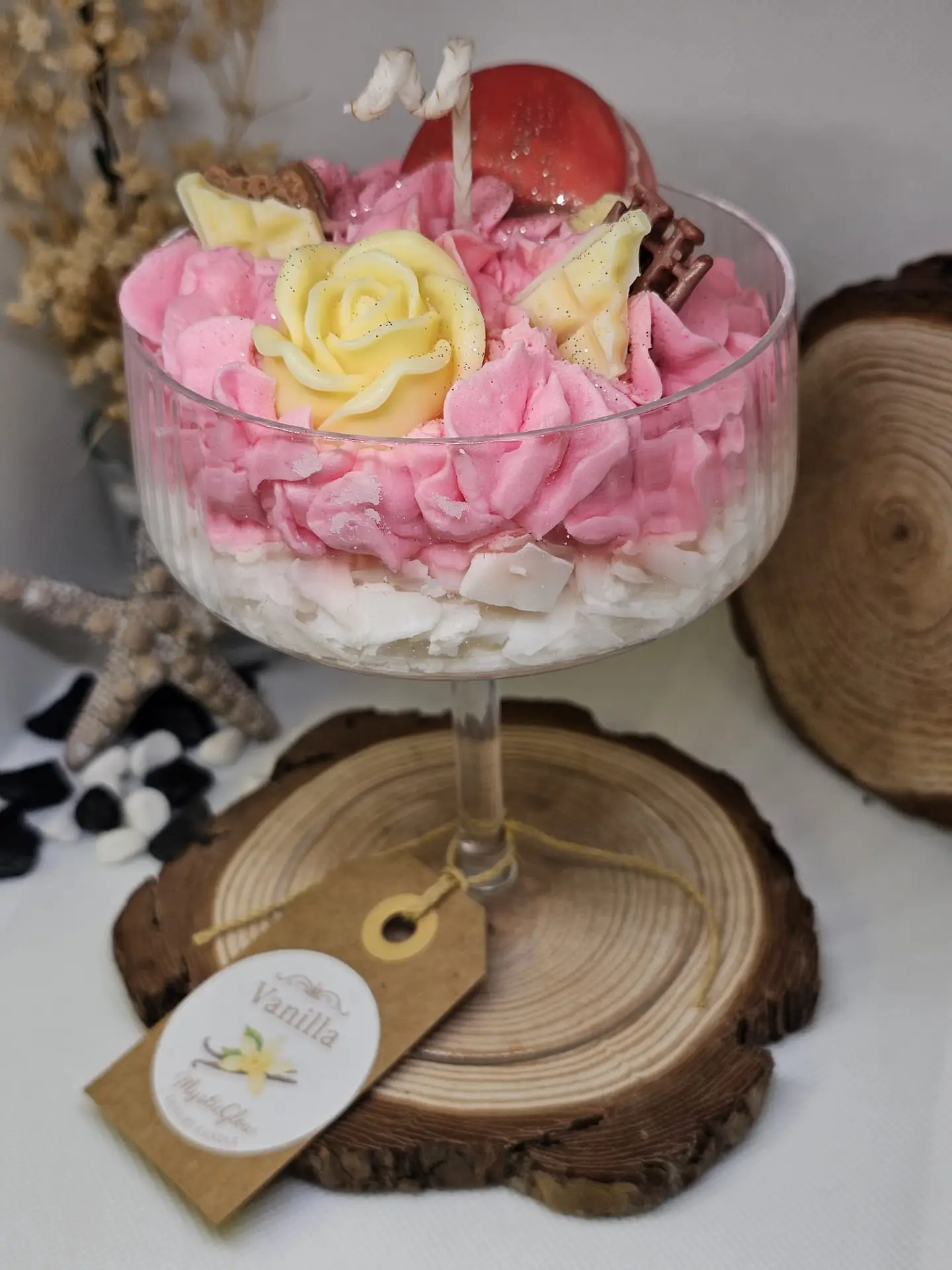 Luxury vanilla-scented candle with pink frosting and chocolate wax details by MysticGlow
