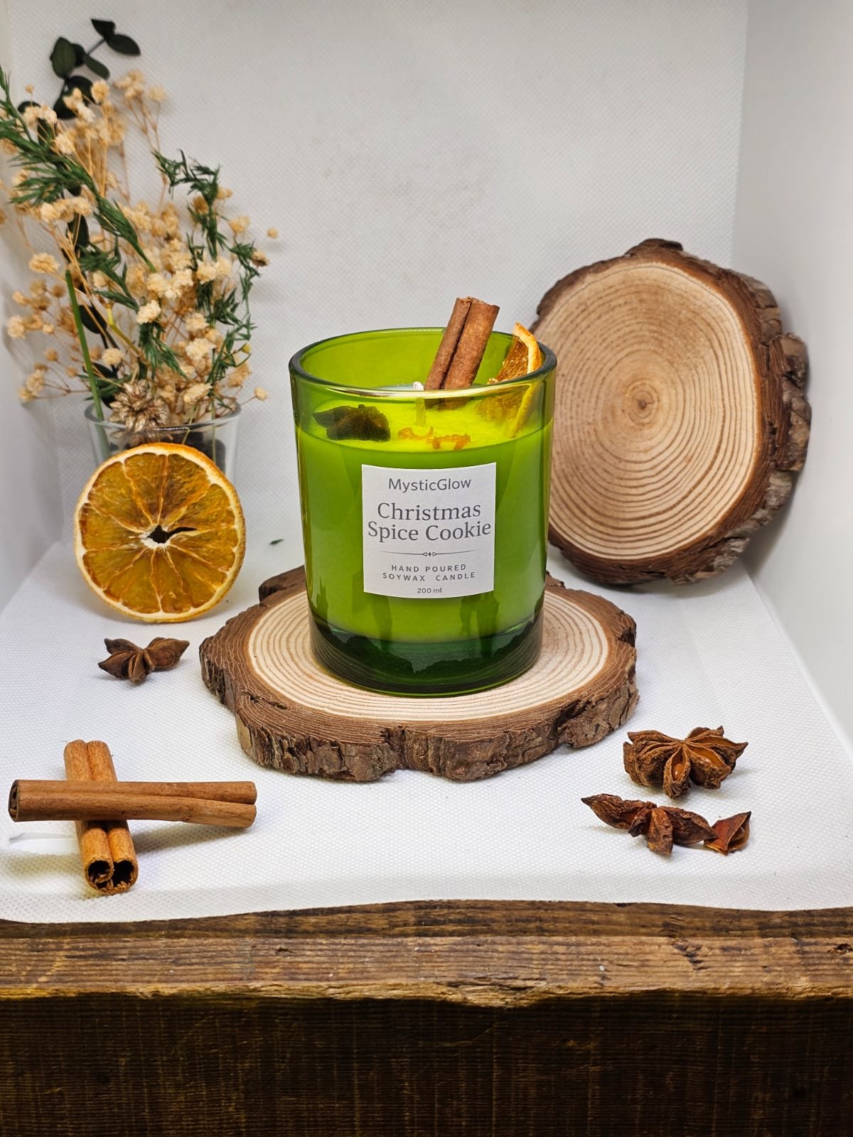 Christmas Spice Cookie soy candle in green glass jar with dried orange slice, cinnamon sticks and star anise – MysticGlow handmade candle