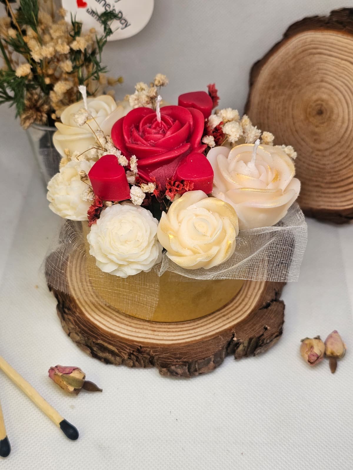 Top view of handmade rose-shaped candles with red and ivory colours – MysticGlow Valentine bouquet
