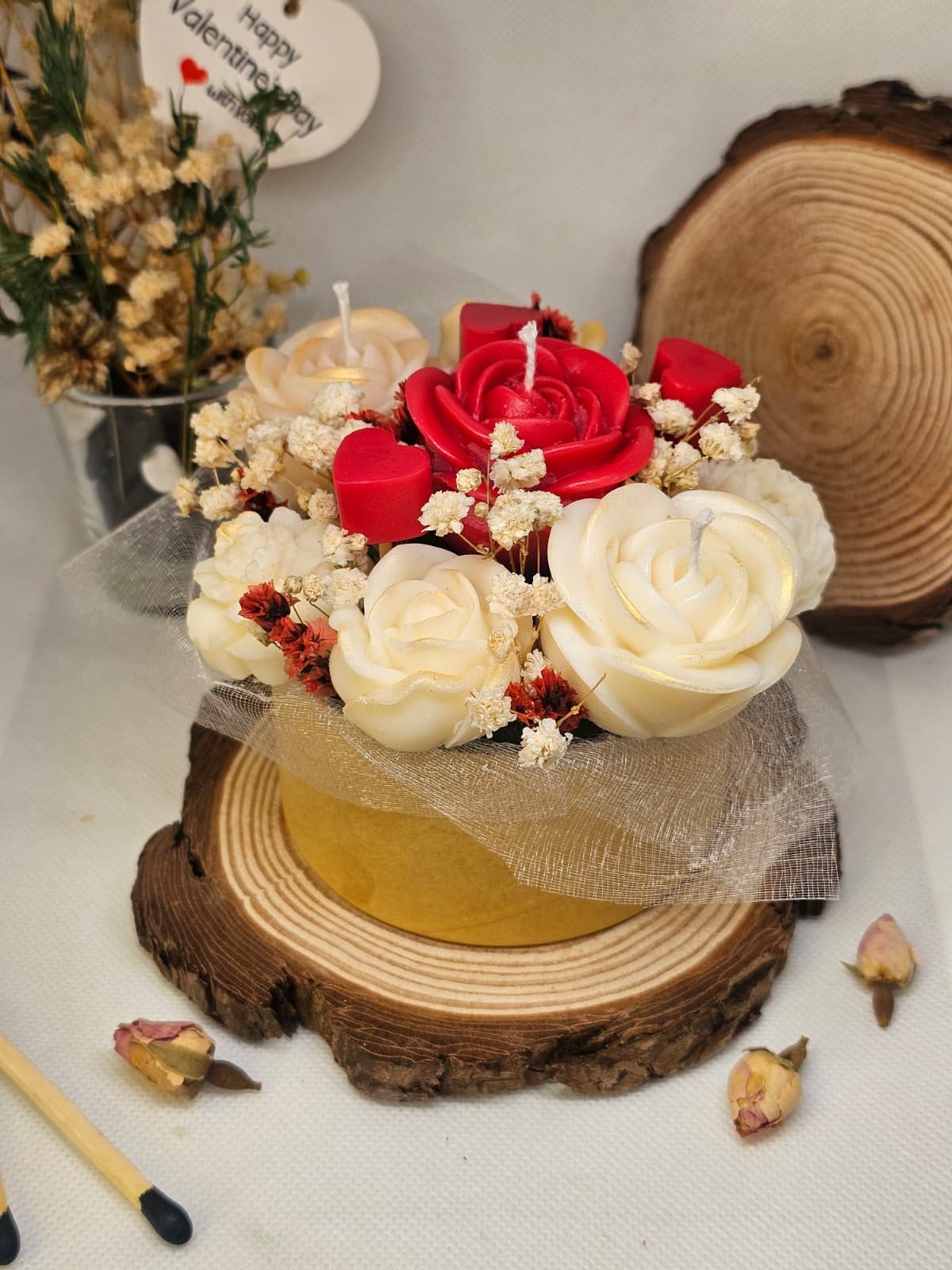 Close-up of handcrafted rose candles with dried flowers – MysticGlow romantic gift