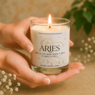 Handmade Aries zodiac soy candle in hands
