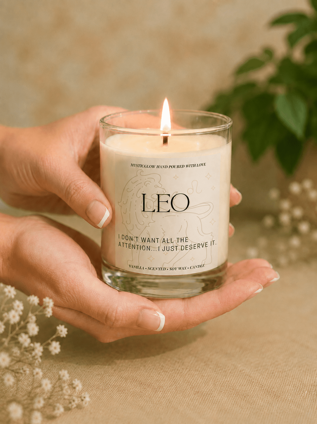 Handmade Leo zodiac soy candle held in hands