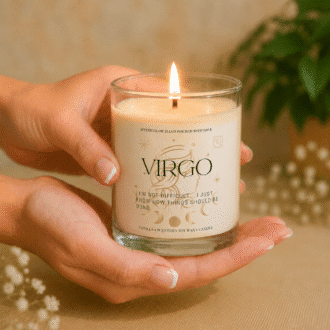 Handmade Virgo zodiac soy candle held in hands